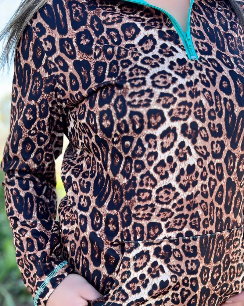 Hear Me Roar Leopard Pullover with Turquoise Zip by Sterling Kreek