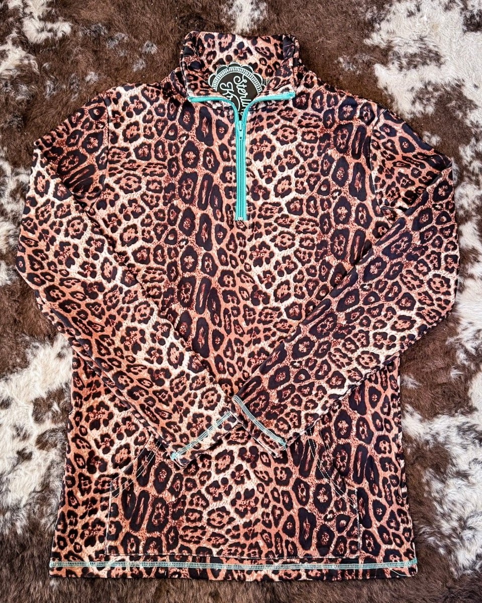 Hear Me Roar Leopard Pullover with Turquoise Zip by Sterling Kreek